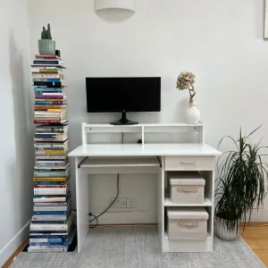Minimalistic white desk with drawer and shelf