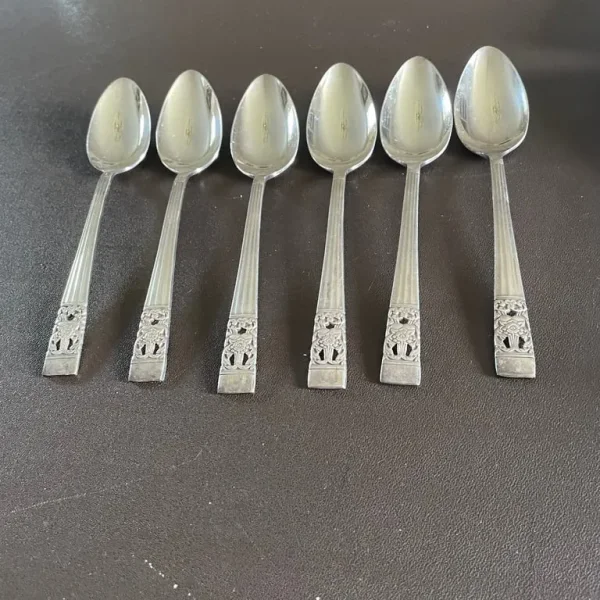 Oneida silver plated dessert spoons