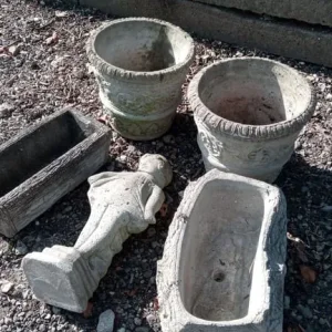 Concrete pots, troughs and girl ornament