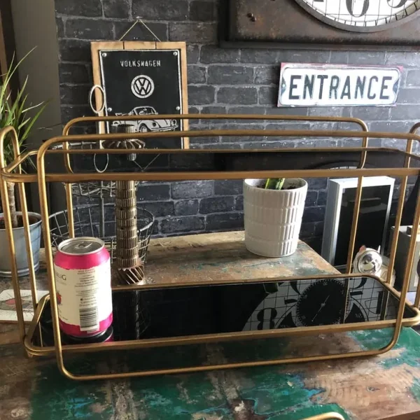 Pair of gold metal and black glass shelves