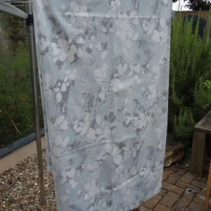 Pair of long floral Dunelm lined eyelet curtains - Image 3