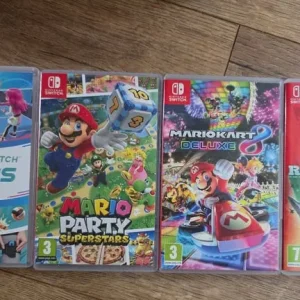 Nintendo Switch with games and accessories - Image 3