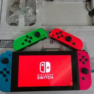 Nintendo Switch with games and accessories - Image 7