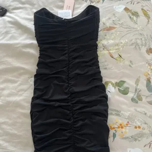 Women’s black oh polly ruched bandeau mini dress - Image 4