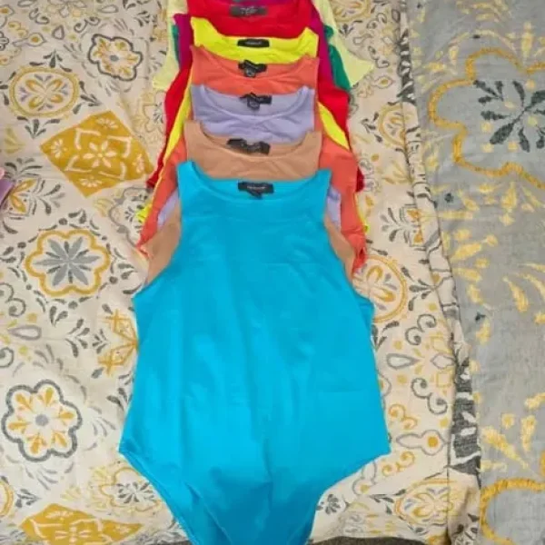 Bundle of body suits size S