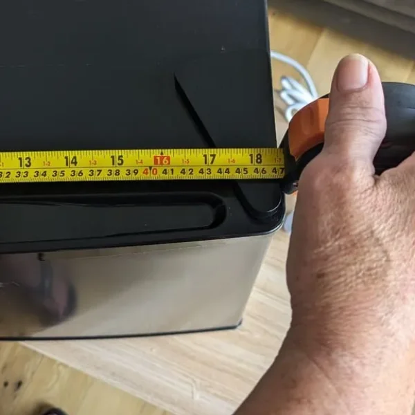 Small black freezer with two shelves