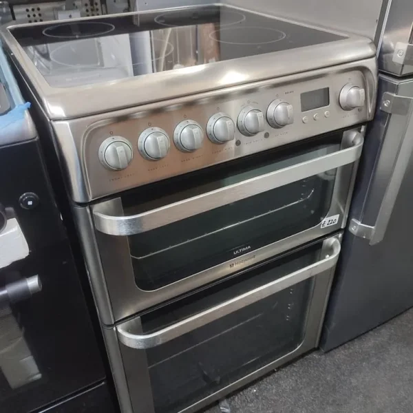 STAINLESS STEEL HOTPOINT ULTIMA 60CM FREESTANDING ELECTRIC COOKER