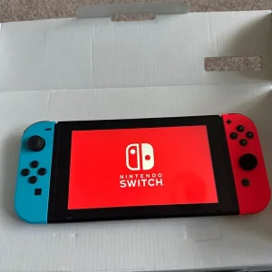 VGC 1st Gen Nintendo Switch w/ 2 games and accessories - Image 2