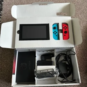 VGC 1st Gen Nintendo Switch w/ 2 games and accessories - Image 3