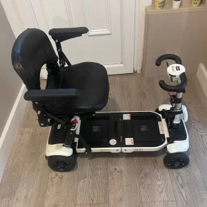 Mobility folding red scooter