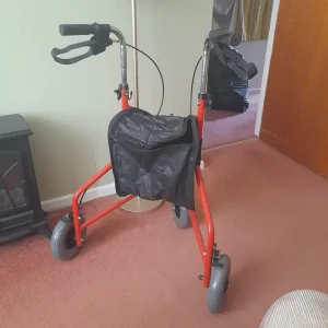 3 wheeled walker with shopping bag and brakes - Image 2