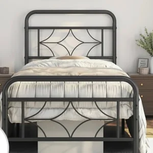 2 x black metal single beds
