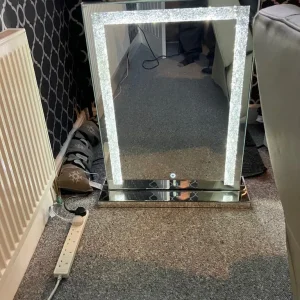 Mirror bling with electric lights can deliver for a small charge