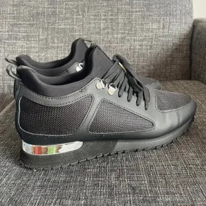 Men’s black Mallet Trainers