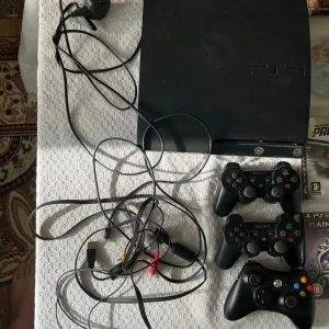 PlayStation 3 with 28 games, 2 controllers, and an Xbox controller - Image 3