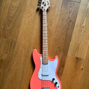Squier Bronco Bass in Coral