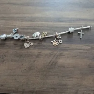Pandora bracelet with all charms - Image 2