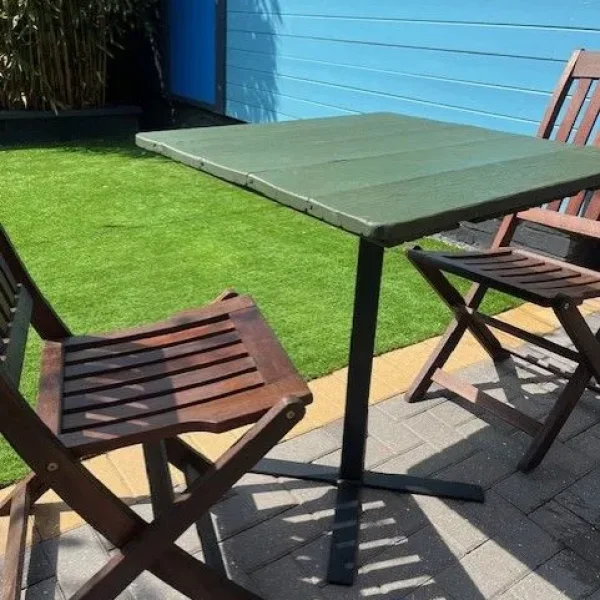 Garden bistro set with camping chairs and sun lounger