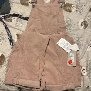 Pink corduroy dungarees