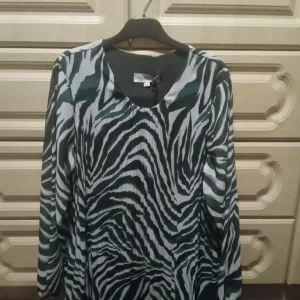 Ladies bottle green and cream top