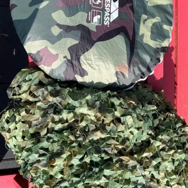 Camouflage net and pop up tent