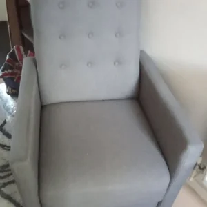 Manually reclining armchair in grey