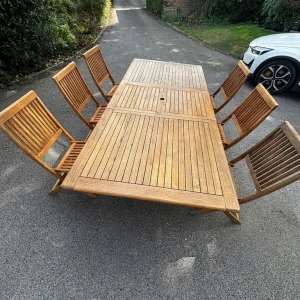 Hardwood extendable table and 6 folding chairs set - Image 2