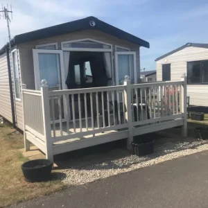 Static caravan on blue dolphin with sea views