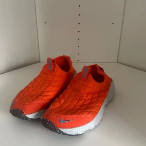 Orange Nike ACG trainers