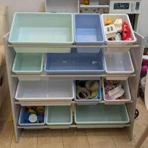Toy storage box with movable sections
