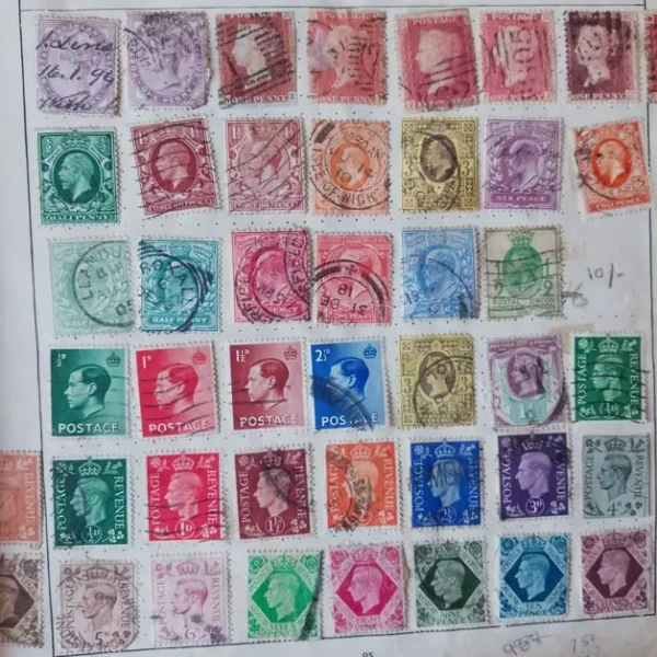 3 postage stamp albums with thousands of old stamps