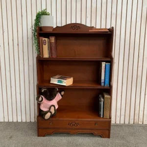 Waterfall bookcase with 3 shelves and a drawer in mahogany-effect finish