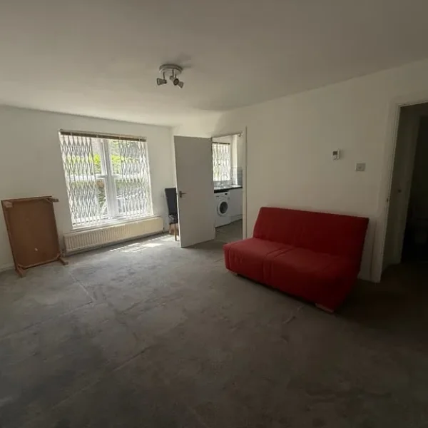 John Lewis red sofa bed with wheels