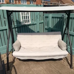 Garden swing seat that converts to bed