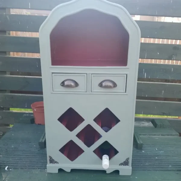 Wine cabinet with hand-painted rack