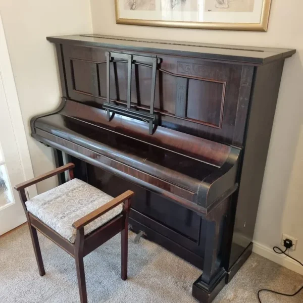 Upright piano and stool
