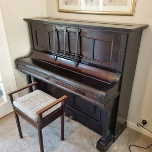 Upright piano and stool