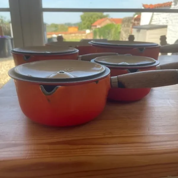 Vintage Le Creuset Volcanic Orange 5 piece saucepan set