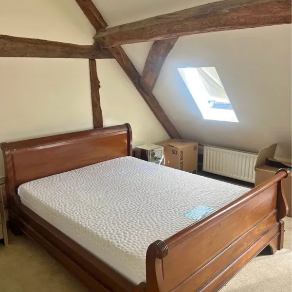 Solid teak king size sleigh bed