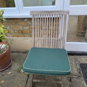 8 forest green piped foam garden cushions - Image 2