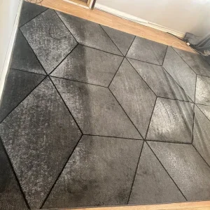 1 large rug and 1 dining rug