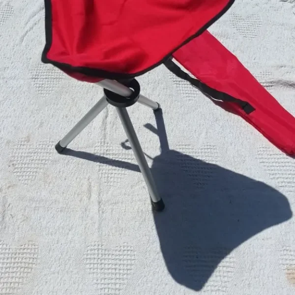 Red folding camping seat with tripod stand