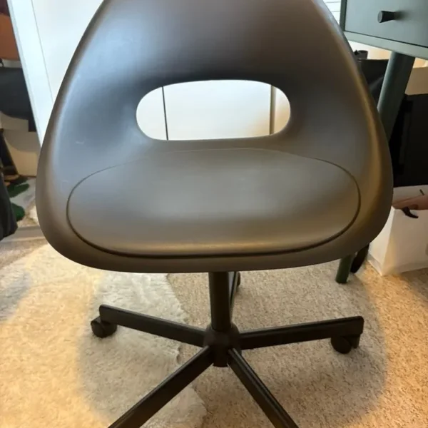 Black desk chair + two round pillows