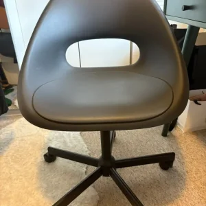 Black desk chair + two round pillows