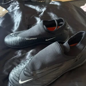 Nike football slip-ons