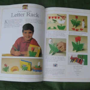 Scrap book with kids' craft cutouts - Image 4