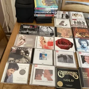 Bundle of CDs, DVDs, and a case - Image 2