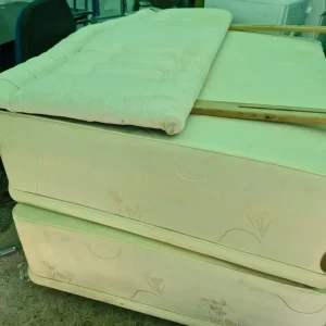 Double divan bed base with cream headboard