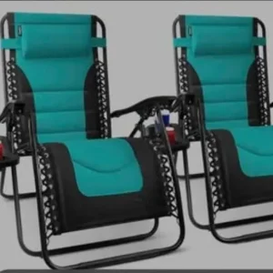 A new pair of teal garden sun loungers