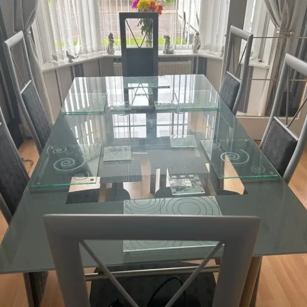 Glass top dining table with 6 chairs